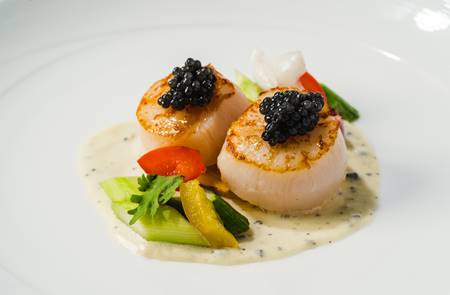 Grilled Scallop sprinkled with Caviar and Truffle